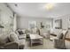 Cozy living room with a comfortable sectional sofa, decorative pillows, and stylish decor at 2008 Reaves Dr, Raleigh, NC 27608