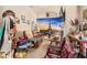 Basement featuring a mural, leather seating, a fireplace, and a television at 201 Blue Heron Dr, Youngsville, NC 27596