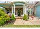 Inviting front porch with charming decor and curb appeal at 201 Blue Heron Dr, Youngsville, NC 27596