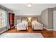Upstairs bedroom with two beds and a large bookshelf at 206 Zapata Ln, Chapel Hill, NC 27517