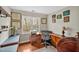 Bright home office with a large window and beautiful hardwood floors at 206 Zapata Ln, Chapel Hill, NC 27517