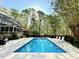 Enjoy a backyard pool with lots of green space at 206 Zapata Ln, Chapel Hill, NC 27517