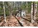 Quaint outdoor shed surrounded by trees at 206 Zapata Ln, Chapel Hill, NC 27517