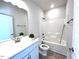 Bathroom with vanity, integrated sink and shower/tub combo at 21 Shoreline Dr, Lillington, NC 27546