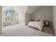 Spacious bedroom with vaulted ceiling, a window, and neutral decor at 2102 Trailridge Ct, Raleigh, NC 27603