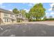 Exterior of home features reserved parking and mature trees at 2102 Trailridge Ct, Raleigh, NC 27603