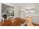 The kitchen features bright white cabinets, stainless steel appliances, and hardwood floors at 2102 Trailridge Ct, Raleigh, NC 27603