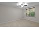 Comfortable bedroom with neutral carpet and natural light from the window at 2204 Secluded Oaks Ct, Wake Forest, NC 27587
