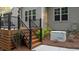 View of deck with stairs and a generator for additional power at 2204 Secluded Oaks Ct, Wake Forest, NC 27587