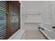 Organized walk-in closet with built-in shelving and ample storage space at 2204 Secluded Oaks Ct, Wake Forest, NC 27587