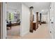 View from basement hall leading to a bedroom and living room area at 2416 W Club Blvd, Durham, NC 27705