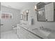 Elegant bathroom with dual sinks, marble countertops, and a glass-enclosed shower at 2416 W Club Blvd, Durham, NC 27705