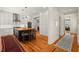Spacious kitchen with island, wooden floors, and high-end stainless steel appliances at 2416 W Club Blvd, Durham, NC 27705