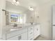 Bathroom displaying a double vanity with a large mirror and ample counter space at 25 Long Needle Ct # 37, Youngsville, NC 27596