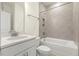 Modern bathroom featuring tiled shower over tub and a granite countertop vanity at 25 Long Needle Ct # 37, Youngsville, NC 27596