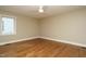 Bedroom with hardwood floors, neutral paint, and natural light at 2916 Rue Sans Famille, Raleigh, NC 27607