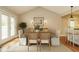 Dining room features neutral tones, vaulted ceilings, and access to the screened porch at 2916 Rue Sans Famille, Raleigh, NC 27607
