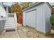 Exterior view of storage shed attached to house and staircase at 2916 Rue Sans Famille, Raleigh, NC 27607