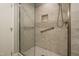 Shower with glass door, built-in shower niche and safety bar at 2916 Rue Sans Famille, Raleigh, NC 27607