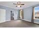 Bright bedroom features two windows and access to bathroom at 303 E J St, Erwin, NC 28339