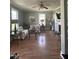 Comfortable living room with hardwood floors and floral sofas at 303 E J St, Erwin, NC 28339