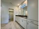 Elegant bathroom featuring double vanity with granite countertop and ample storage space at 316 Catheys Creek Cir, Wendell, NC 27591