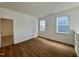 Bedroom with hardwood floors and plenty of natural light, perfect for a home office or guest room at 316 Catheys Creek Cir, Wendell, NC 27591