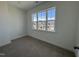 Bedroom with large window overlooking neighborhood at 316 Catheys Creek Cir, Wendell, NC 27591