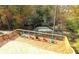Wooden deck with cable railing overlooking the wooded area at 316 Catheys Creek Cir, Wendell, NC 27591