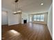 Spacious living room with a fireplace and lots of natural light at 316 Catheys Creek Cir, Wendell, NC 27591