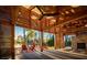 Outdoor pavilion with a stone fireplace and relaxing lake views at 316 Catheys Creek Cir, Wendell, NC 27591