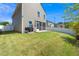 Spacious backyard has a well-maintained lawn, privacy fence, and screened-in porch at 317 City Center Ln, Wendell, NC 27591
