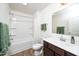 Cozy bathroom with a tub-shower combo and a single sink vanity at 317 City Center Ln, Wendell, NC 27591