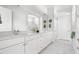 Elegant bathroom featuring double sinks, white countertops, cabinets and large mirror at 330 Middleton Pl, Chapel Hill, NC 27516