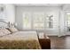 Well lit bedroom with wood floors and light colored walls at 330 Middleton Pl, Chapel Hill, NC 27516