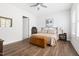 Well lit bedroom with wood floors and light colored walls at 330 Middleton Pl, Chapel Hill, NC 27516