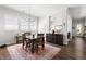 Dining room with hardwood floors, modern lighting, and neutral paint at 330 Middleton Pl, Chapel Hill, NC 27516