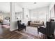 Cozy living room with neutral furniture, a large rug, and access to another room at 330 Middleton Pl, Chapel Hill, NC 27516