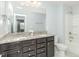 Bright bathroom with granite countertops, double sinks, and modern fixtures, offering a clean and functional space at 3360 Bordwell Ridge Dr, New Hill, NC 27562