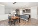 Modern kitchen featuring stainless steel appliances, granite countertops, and a stylish central island at 3360 Bordwell Ridge Dr, New Hill, NC 27562