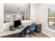 Comfortable office space featuring granite countertops and ample natural light at 3360 Bordwell Ridge Dr, New Hill, NC 27562