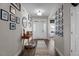 Bright entryway featuring hardwood floors, decorative accents, and ample wall decor at 34 Tea Olive Ct, Clayton, NC 27520