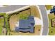 Stunning aerial view of a home with a fenced yard and a cozy fire pit area at 34 Tea Olive Ct, Clayton, NC 27520