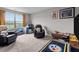 A comfy living room with oversized armchairs, with plenty of room for lounging and relaxation at 34 Tea Olive Ct, Clayton, NC 27520