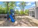 Spacious backyard featuring a playset, perfect for Gathering fun and outdoor activities at 356 Avery Glenn Way, Fuquay Varina, NC 27526