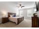 Comfortable bedroom features large windows, plush carpet, and ample space at 356 Avery Glenn Way, Fuquay Varina, NC 27526