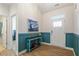 Inviting hallway with wood floors, stylish decor, and a view of the front door at 356 Avery Glenn Way, Fuquay Varina, NC 27526