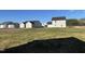 A large backyard with green grass, perfect for outdoor activities and relaxation at 37 Heatherglenn Cir, Princeton, NC 27569