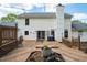 Expansive wooden deck with built-in seating, perfect for outdoor entertaining, attached to the house at 3787 Pleasant Hill Church, Siler City, NC 27344