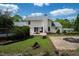 Backyard featuring a deck, pool, stone accents, and mature landscaping, offering space for entertaining at 3787 Pleasant Hill Church, Siler City, NC 27344